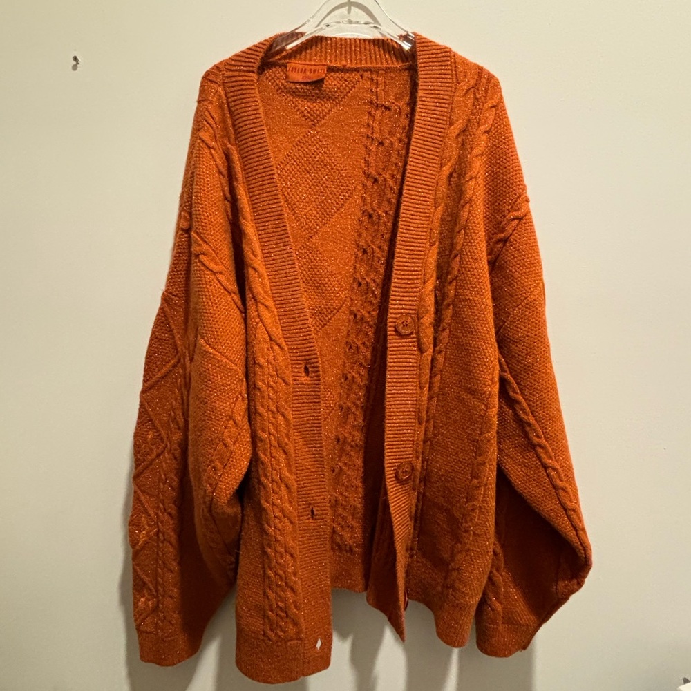Taylor Swift: The Life of a Showgirl — Orange Cardigan